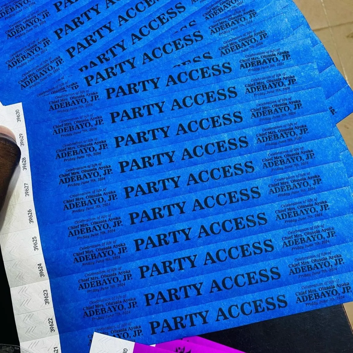 top quality funeral party burial access paper handband handtag design and printing best quality funeral party access paper wristband handtag burial gate pass design and printing in lagos nigeria.