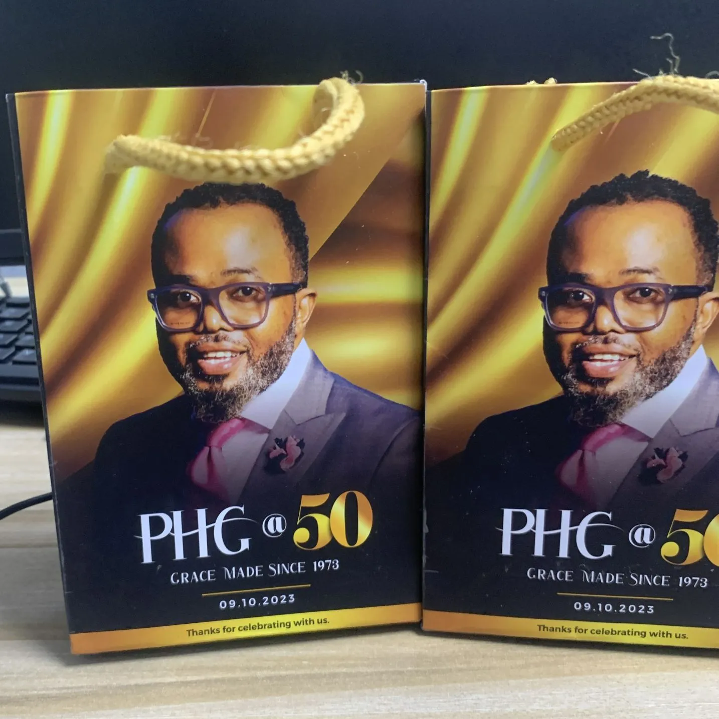 Best high top quality customized branded custom retractable 50th years birthday event souvenir shopping paper bag design and printing in Lagos,
                                                        Abuja, Nigeria, Africa.