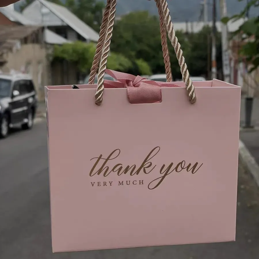 Top high best quality customized branded shopping paper bag branding design and printing in Lagos, Abuja, Nigeria Africa.