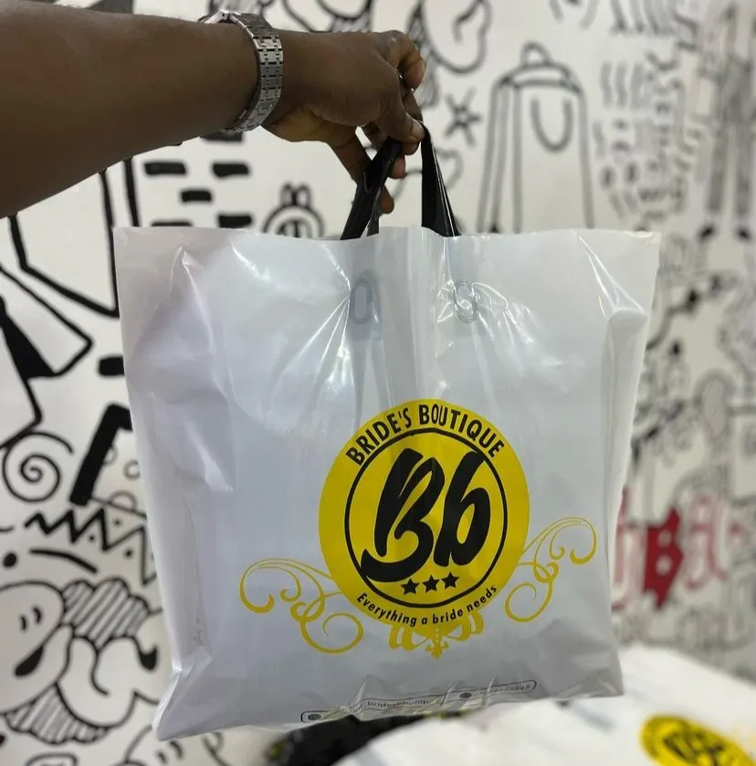Top high best quality customized branded fancy loop handle nylon bag branding design and printing in Lagos, Abuja, Nigeria Africa.