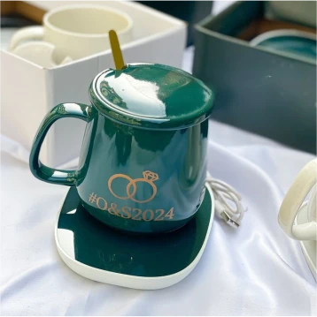Customized branded best high top quality custom luxury premium corporate wedding/burial coffee ceramic mug with heating pad souvenir gift item design and printing in Lagos, Abuja, Nigeria, Africa.