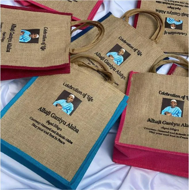 High best top quality customized branded custom premium retractable fancy funeral/burial event souvenir fashionable jute bag design and printing
                                                        in Lagos, Abuja, Nigeria, Africa.
